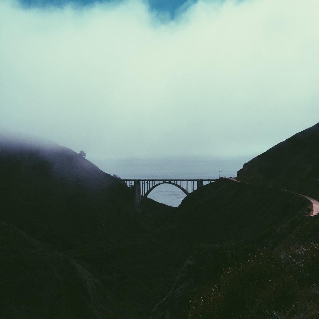 BIXBY  In cloud near ancient chasm bridged  We mortals swarm by infant impulse  To paint ourselves over terra's remnant scars  On pocket-sized cave walls  